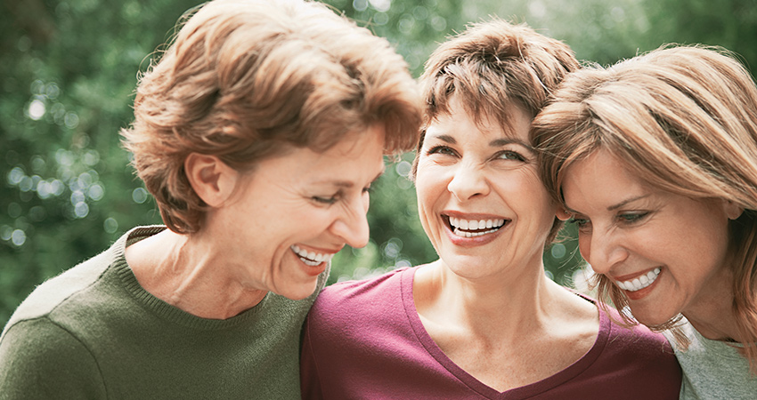 Three lady smiling portrait